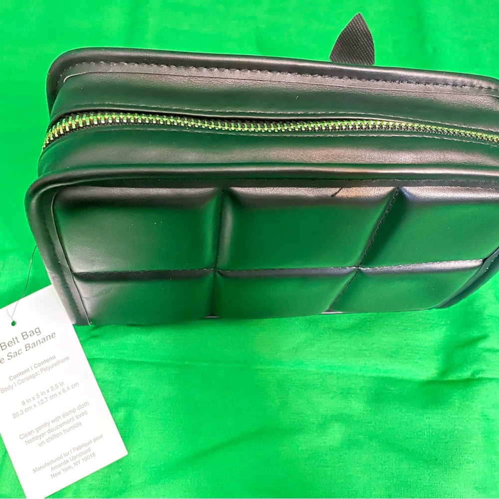BNWT. Black belt bag w/ gold zippers by Amanda Uprichard New York.